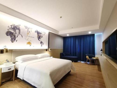 Imagen de la habitación del Hotel Kyriad Marvelous Guangzhou North Railway Station. Foto 18