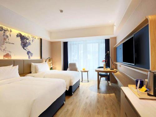 Imagen general del Hotel Kyriad Marvelous Haerbin West High-Speed Railway Station Wanda. Foto 5