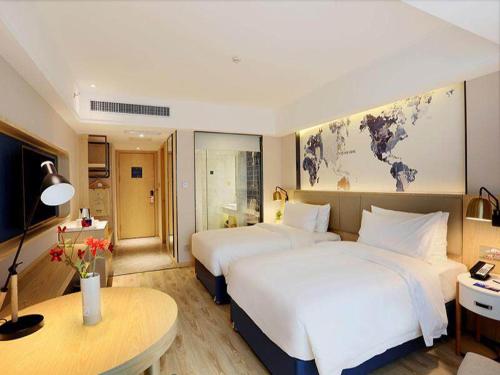 Imagen general del Hotel Kyriad Marvelous Haerbin West High-Speed Railway Station Wanda. Foto 7