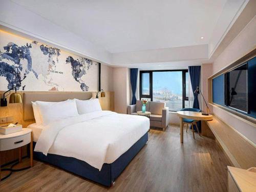 Imagen general del Hotel Kyriad Marvelous Haerbin West High-Speed Railway Station Wanda. Foto 8