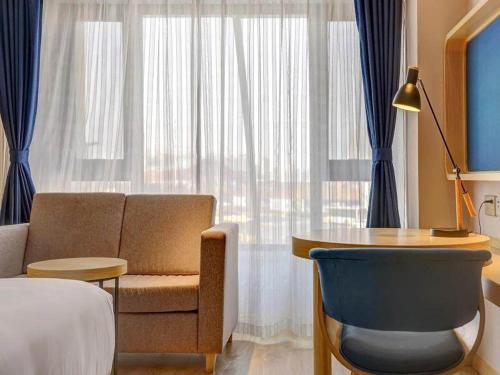Imagen de la habitación del Hotel Kyriad Marvelous Haerbin West High-Speed Railway Station Wanda. Foto 14