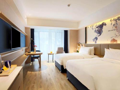 Imagen de la habitación del Hotel Kyriad Marvelous Haerbin West High-Speed Railway Station Wanda. Foto 19
