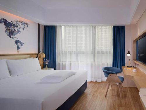 Imagen de la habitación del Hotel Kyriad Marvelous Haikou Free Trade Zone. Foto 9