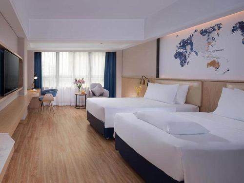 Imagen de la habitación del Hotel Kyriad Marvelous Haikou Free Trade Zone. Foto 10