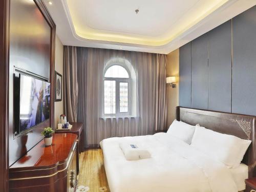 Imagen de la habitación del Hotel Kyriad Marvelous Harbin Railway Station Central Avenue. Foto 15