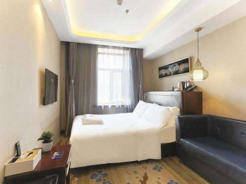 Imagen general del Hotel Kyriad Marvelous Harbin Railway Station Central Avenue. Foto 6