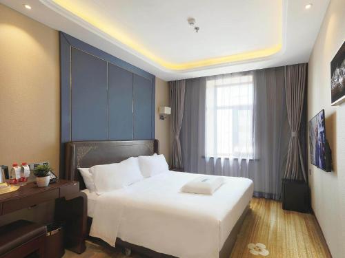 Imagen de la habitación del Hotel Kyriad Marvelous Harbin Railway Station Central Avenue. Foto 19