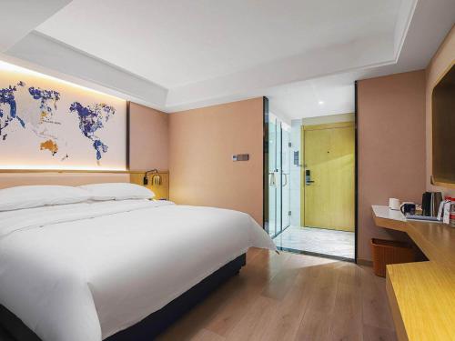 Imagen general del Hotel Kyriad Marvelous Henan Xinyang Pingqiao Plaza. Foto 2