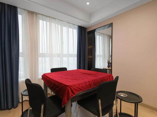 Imagen general del Hotel Kyriad Marvelous Henan Xinyang Pingqiao Plaza. Foto 3