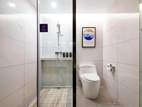 Imagen general del Hotel Kyriad Marvelous Henan Xinyang Pingqiao Plaza. Foto 5