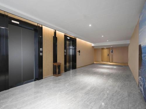 Imagen general del Hotel Kyriad Marvelous Henan Xinyang Pingqiao Plaza. Foto 6