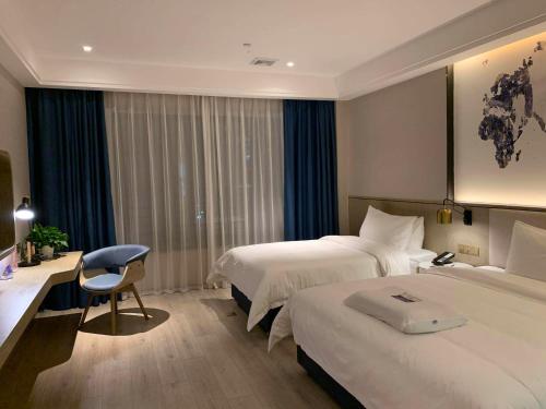 Imagen general del Hotel Kyriad Marvelous Heyuan Hakka Culture Park. Foto 7