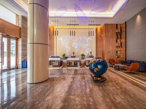 Imagen general del Hotel Kyriad Marvelous Heyuan Hakka Culture Park. Foto 8