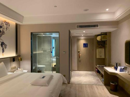 Imagen general del Hotel Kyriad Marvelous Heyuan Hakka Culture Park. Foto 10