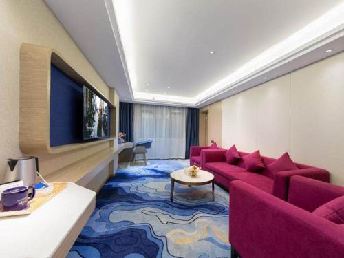 Imagen de la habitación del Hotel Kyriad Marvelous Heyuan Longchuan. Foto 17