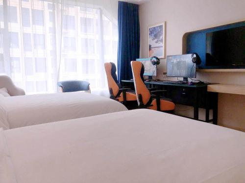 Imagen general del Hotel Kyriad Marvelous Heyuan Wanda Plaza. Foto 1