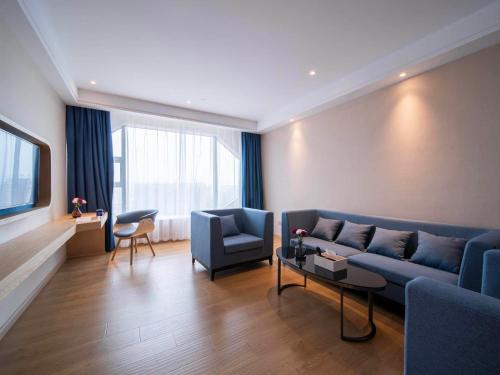 Imagen general del Hotel Kyriad Marvelous Heyuan Wanda Plaza. Foto 8