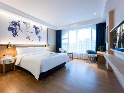 Imagen general del Hotel Kyriad Marvelous Heyuan Wanda Plaza. Foto 9