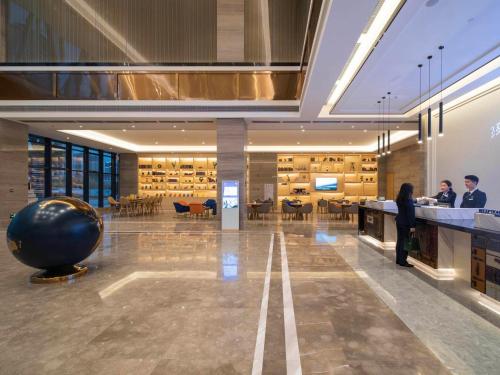 Imagen general del Hotel Kyriad Marvelous Heyuan Wanda Plaza. Foto 10