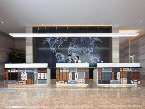 Imagen general del Hotel Kyriad Marvelous Heyuan Wanlong City. Foto 6