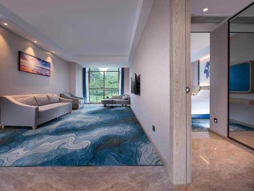 Imagen de la habitación del Hotel Kyriad Marvelous Hezhou Wanda Plaza. Foto 15