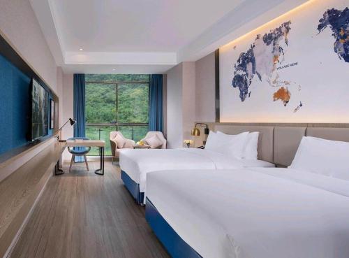 Imagen general del Hotel Kyriad Marvelous Hezhou Wanda Plaza. Foto 10