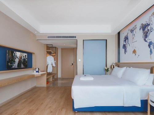 Imagen de la habitación del Hotel Kyriad Marvelous Huizhou Boluo Longxi. Foto 15