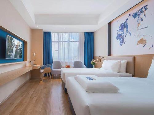 Imagen de la habitación del Hotel Kyriad Marvelous Huizhou Boluo Longxi. Foto 16