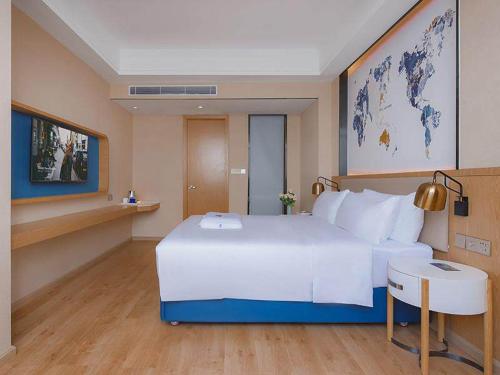 Imagen de la habitación del Hotel Kyriad Marvelous Huizhou Boluo Longxi. Foto 17