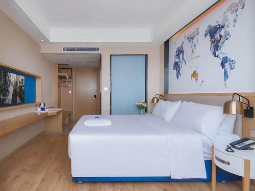 Imagen de la habitación del Hotel Kyriad Marvelous Huizhou Boluo Longxi. Foto 20
