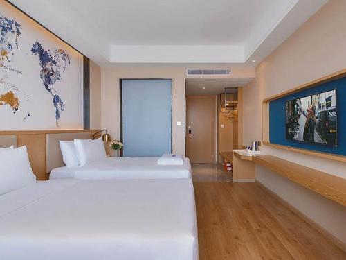 Imagen general del Hotel Kyriad Marvelous Huizhou Boluo Longxi. Foto 13