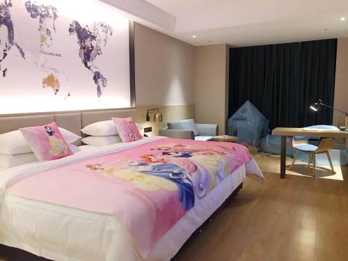 Imagen de la habitación del Hotel Kyriad Marvelous Huizhou Boluo Yuanzhou. Foto 16
