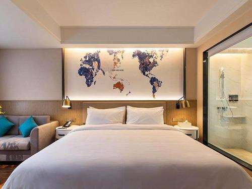 Imagen general del Hotel Kyriad Marvelous Kunming High-Tech Zone Wuyue Plaza. Foto 1