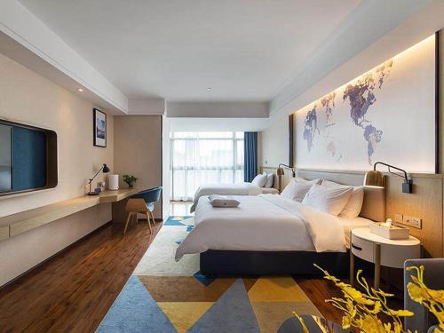 Imagen general del Hotel Kyriad Marvelous Kunming High-Tech Zone Wuyue Plaza. Foto 3