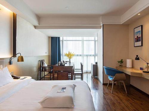 Imagen general del Hotel Kyriad Marvelous Kunming High-Tech Zone Wuyue Plaza. Foto 11