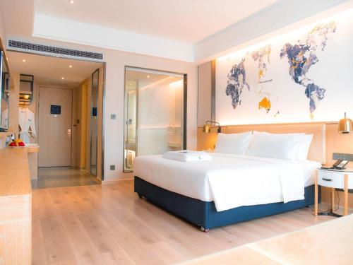 Imagen de la habitación del Hotel Kyriad Marvelous Luoding Ring City East Road. Foto 16