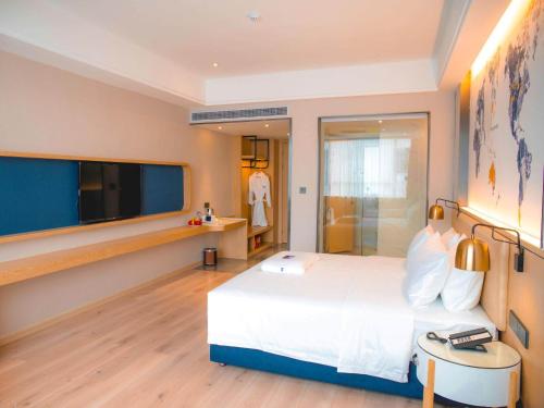 Imagen de la habitación del Hotel Kyriad Marvelous Luoding Ring City East Road. Foto 17