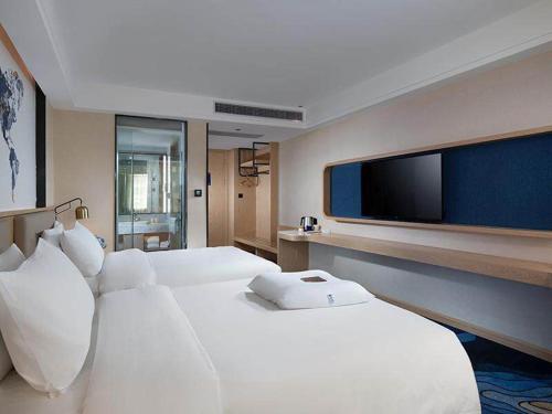Imagen general del Hotel Kyriad Marvelous Maoming Dianbai Wanda Plaza. Foto 1