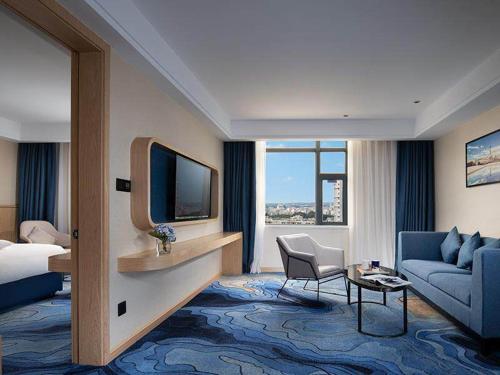 Imagen de la habitación del Hotel Kyriad Marvelous Maoming Dianbai Wanda Plaza. Foto 12