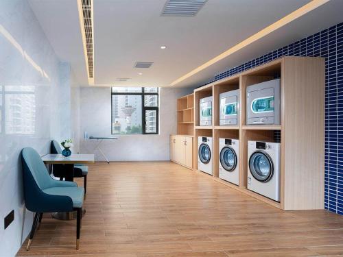 Imagen general del Hotel Kyriad Marvelous Maoming Dianbai Wanda Plaza. Foto 7