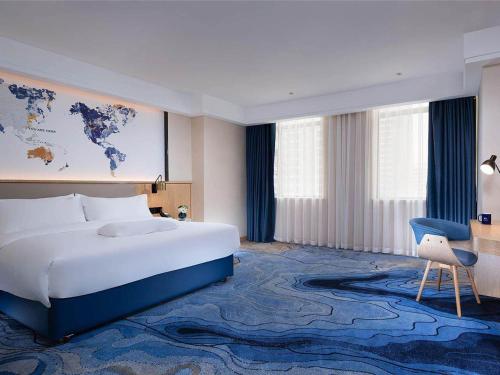 Imagen de la habitación del Hotel Kyriad Marvelous Maoming Dianbai Wanda Plaza. Foto 18