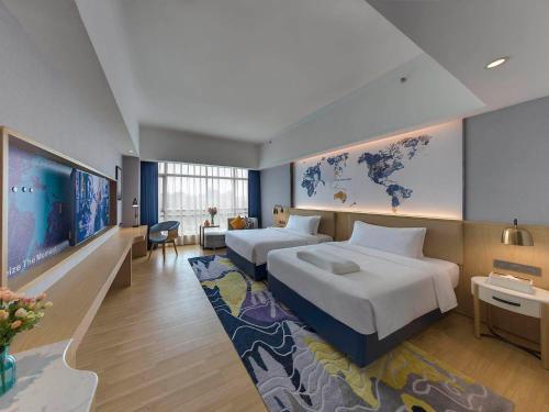 Imagen general del Hotel Kyriad Marvelous Qingyuan City Square. Foto 1