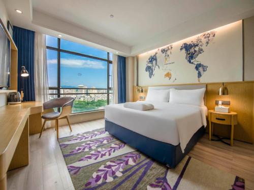 Imagen general del Hotel Kyriad Marvelous Qingyuan City Square. Foto 2