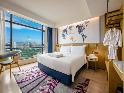 Imagen general del Hotel Kyriad Marvelous Qingyuan City Square. Foto 6