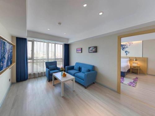 Imagen de la habitación del Hotel Kyriad Marvelous Qingyuan City Square. Foto 15