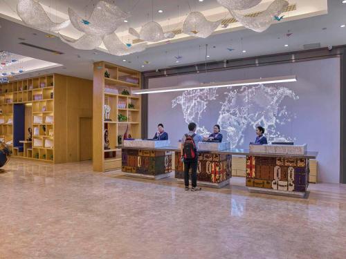 Imagen general del Hotel Kyriad Marvelous Qingyuan City Square. Foto 11