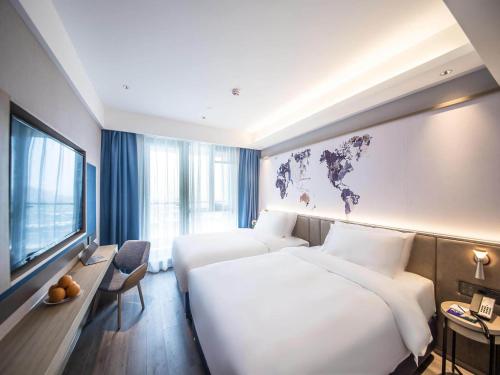 Imagen general del Hotel Kyriad Marvelous Qinhuangdao Nandaihe. Foto 3