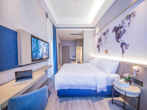 Imagen general del Hotel Kyriad Marvelous Qinhuangdao Nandaihe. Foto 11
