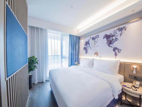 Imagen general del Hotel Kyriad Marvelous Qinhuangdao Nandaihe. Foto 12