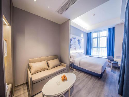 Imagen de la habitación del Hotel Kyriad Marvelous Qinhuangdao Nandaihe. Foto 19